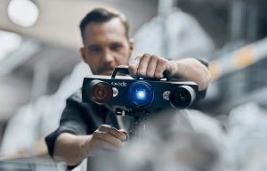 A man using ZEISS 3D scanning solution ATOS Q