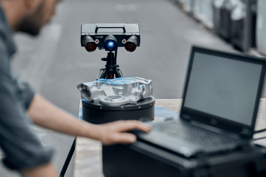 The image shows the mobile 3D scanner ATOS Q
